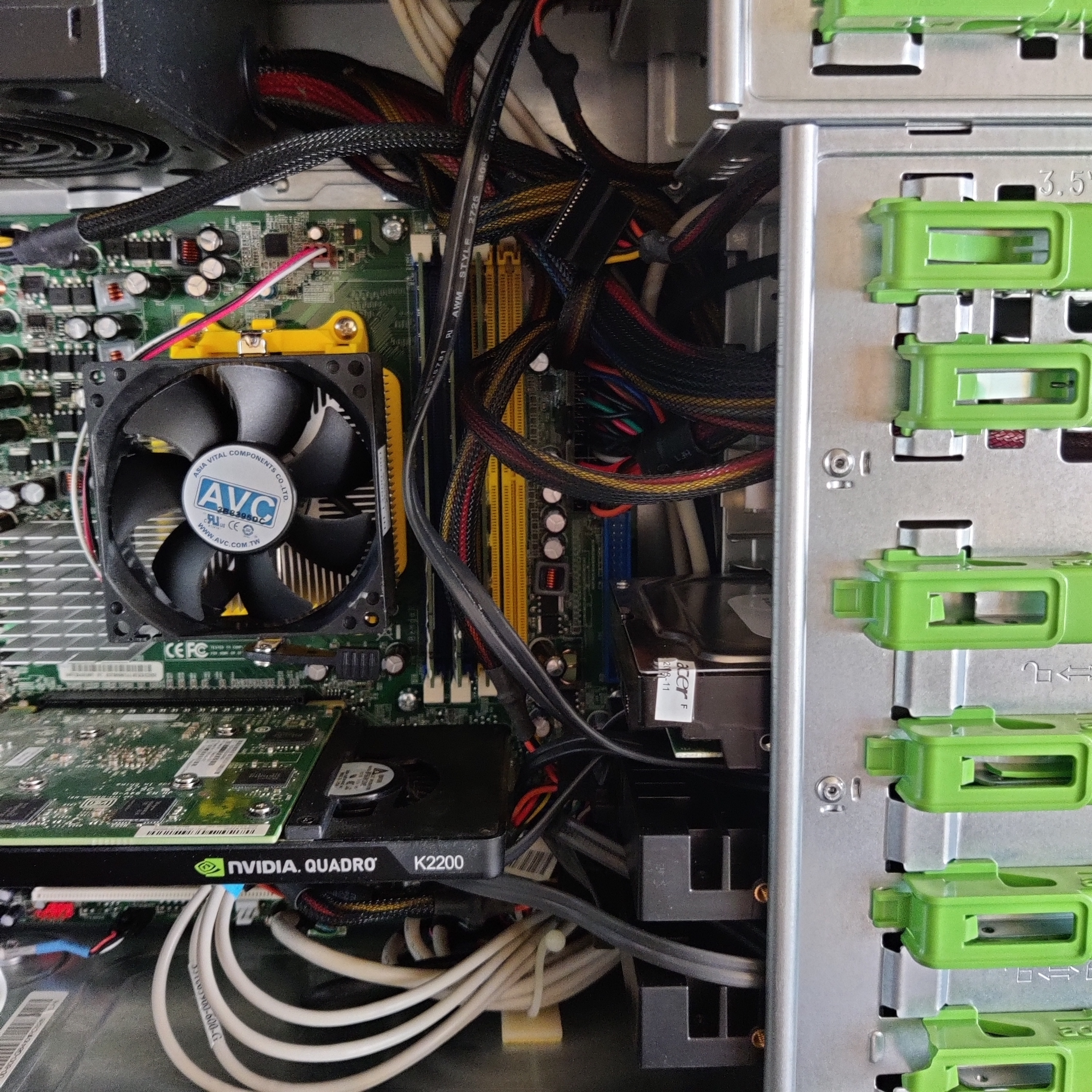 Inside the case post PSU replacement, showing a mess of cables