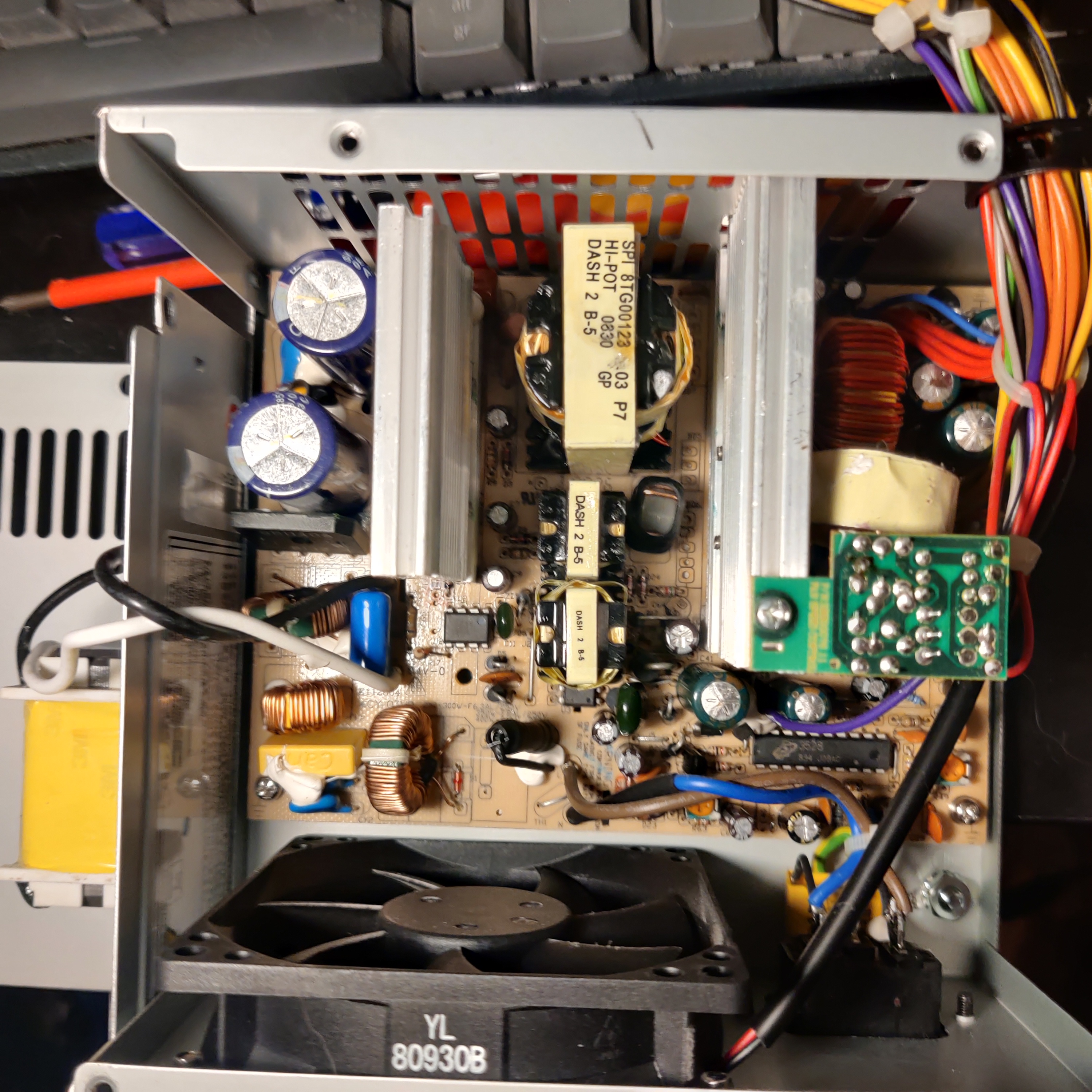 The PSU open, showing bulging caps